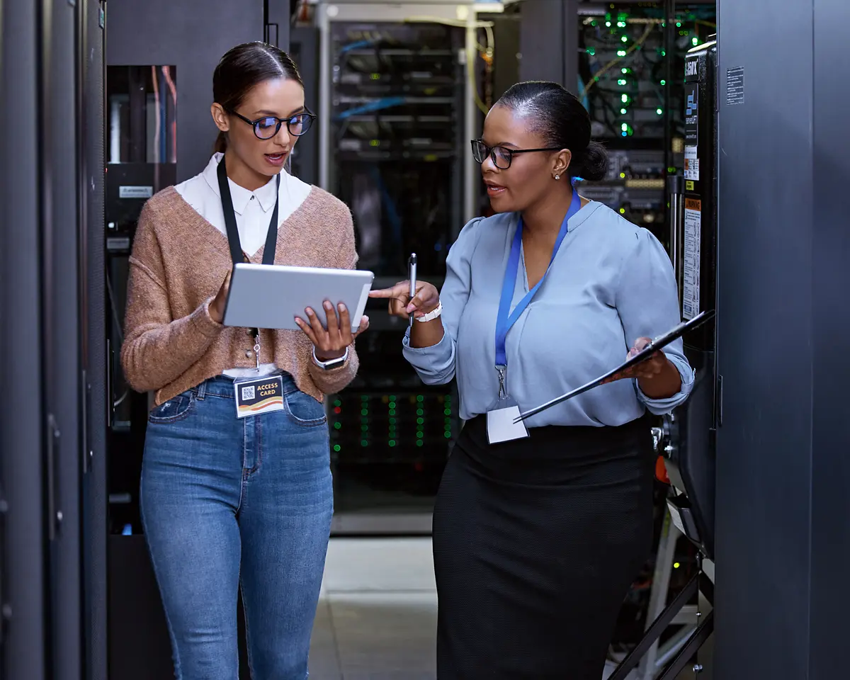 CoreTech team working in a server room